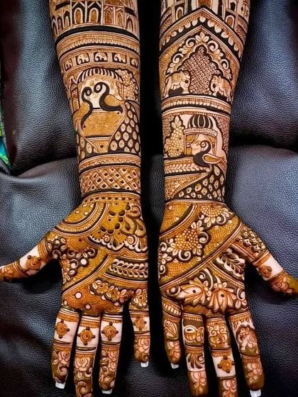 This design is rich with traditional Rajasthani art, including elephants, peacocks, and kalash motifs. The intricate line work and shading create a beautiful, dense pattern.