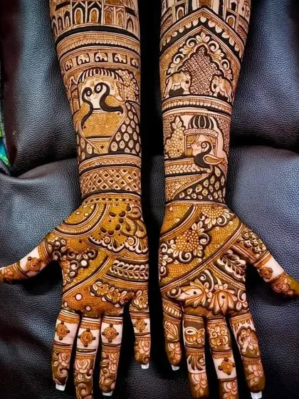 A traditional design with a mix of swan, elephant, and peacock motifs, creating a rich and varied pattern.