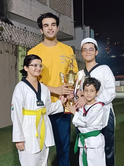 Another portrait of our champions. Their hard work in the dojang paid off on the competition floor.