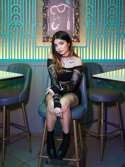 A full look at my outfit for the night. I love combining different textures and styles to create a unique look for every performance.