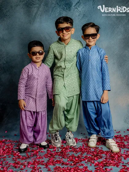 Who says traditional can't be cool? Our Patiala sets are designed for style and play, seen here in vibrant shades of purple, green, and blue. They are the perfect festive outfits for boys with big personalities.