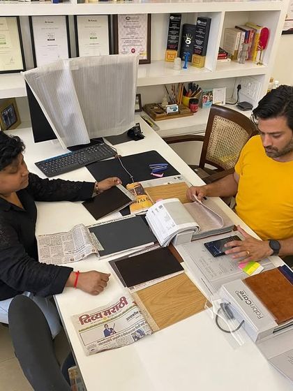 Another look at a client meeting in our office. We work closely with our clients, reviewing samples and ideas to ensure the final design is a true reflection of their personality.