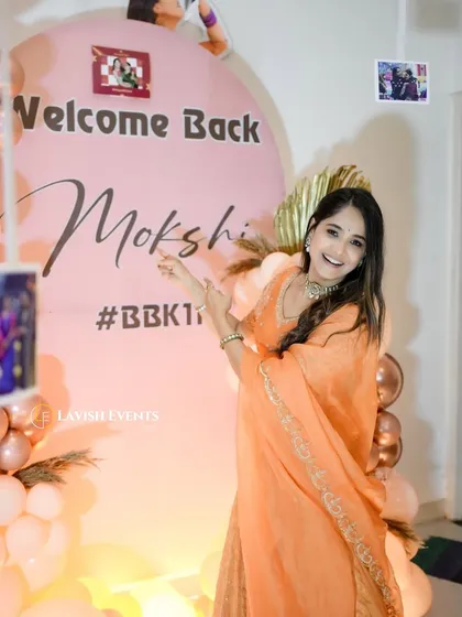More moments from Mokshitha Pai's welcome home celebration, showing her interacting with the personalized decor we created.