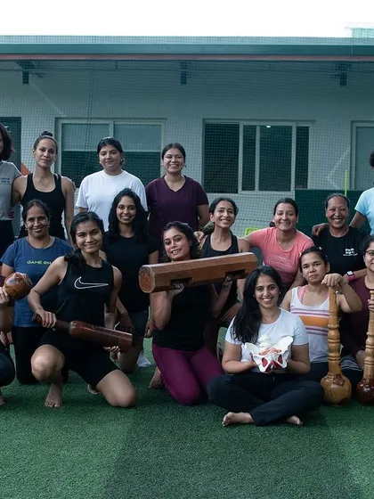A group of women from a training session pose together, smiling and proud. This photo embodies the camaraderie and sense of accomplishment that defines the Tagda Tribe.