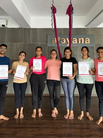 The whole group together. Congratulations to this wonderful batch of newly certified aerial yoga teachers.