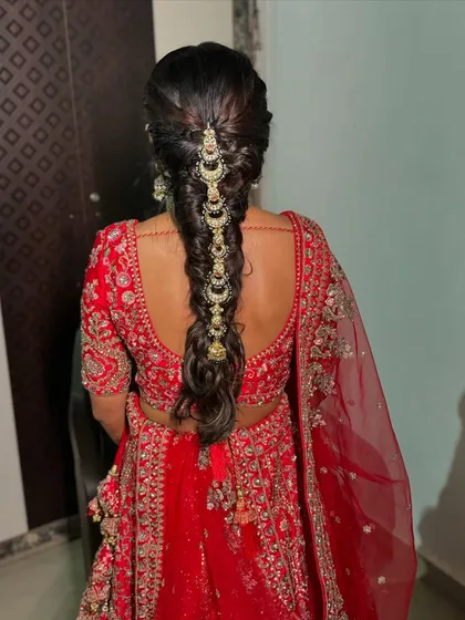A full view of the elegant bridal braid, a timeless choice for a traditional wedding look.