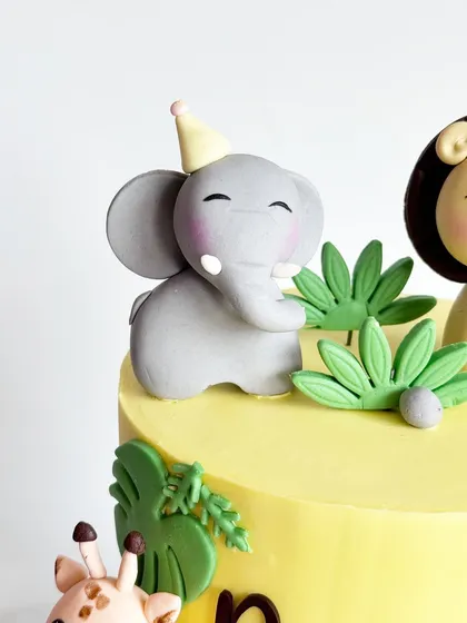 Look at this sweet little elephant! All my animal toppers are handcrafted from fondant, making them a special keepsake from your child's birthday celebration.
