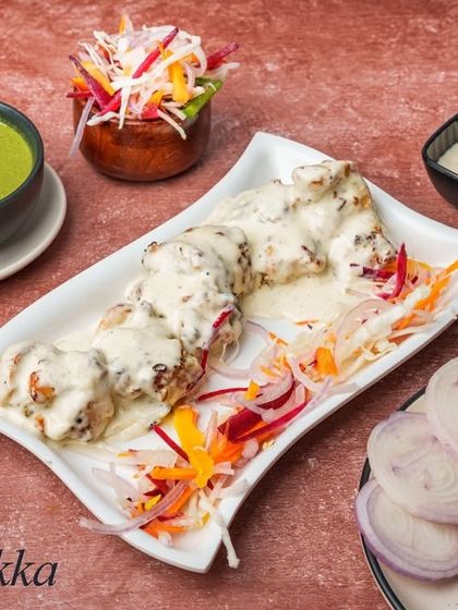 For those who prefer a milder flavour, our Malai Tikka is perfect. The chicken is marinated in a creamy mixture of cream, cheese, and gentle spices, making it incredibly tender and rich.