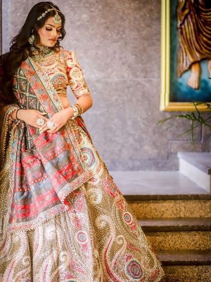 A full view of our intricately embroidered paisley lehenga. This outfit is a work of art, perfect for the bride who appreciates detailed craftsmanship and a timeless design.