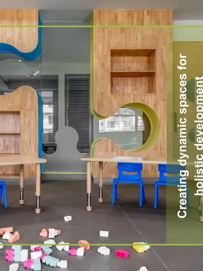 A classroom at Amity International School, Mohali, where puzzle-piece walls and adjustable-height tables create a dynamic space for holistic development. The blocks on the floor emphasize the hands-on, playful nature of learning.
