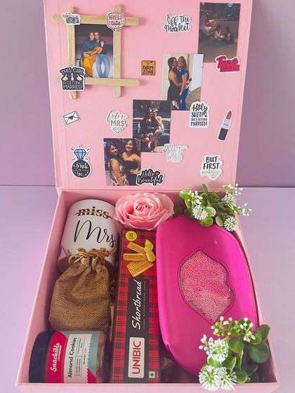 Another version of the "Bride to be" hamper, this time with a stylish pouch instead of makeup. I can customize the contents completely.