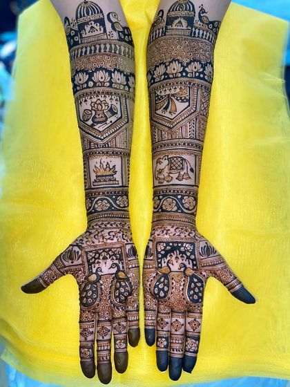 A clear, straight-on shot of the multi-motif design, highlighting the different symbolic elements on each arm.