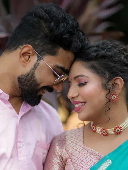 A close-up of a happy couple during their engagement pooja. I focus on creating natural, subtle makeup for intimate ceremonies that looks beautiful both in person and in photographs.