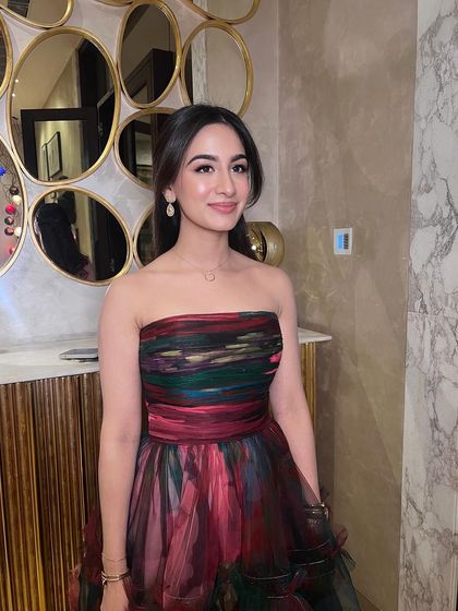 This stunner knows that less is more. Her minimal makeup look is perfect for any party, proving that you don't need heavy layers to look and feel beautiful.