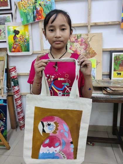 More happy faces and amazing creations from our specialty workshops, including tote bags, Mother's Day gifts, and abstract art explorations.