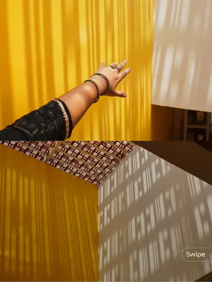 The play of light and shadow on a vibrant yellow wall from a patterned skylight in the Raghavendra Residence. This is how light becomes an active element in the design.