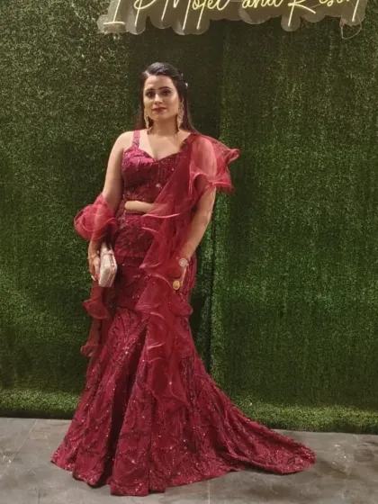 A client looking gorgeous in a red ruffled mermaid-style lehenga. This is a fantastic option for a cocktail party or sangeet.