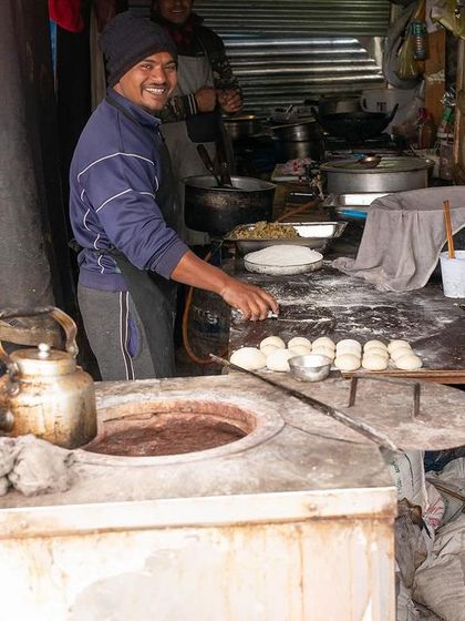 Along the trekking routes, small dhabas provide warmth and nourishment. A smiling face and hot food are a welcome comfort in the cold mountain air. These moments of simple hospitality are an essential part of the pilgrimage experience.