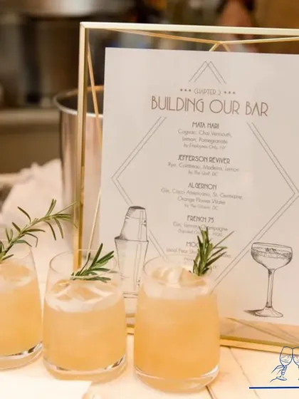 A beautifully crafted cocktail menu in a gold geometric frame, perfectly matching the modern and elegant theme of the event. The custom-designed menu adds a touch of sophistication to the bar.
