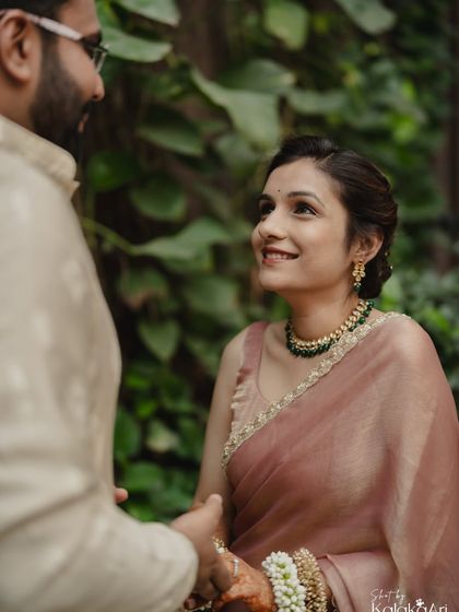 A beautiful, candid close-up of the bride looking lovingly at her groom. Her smile captures the essence of her happiness.