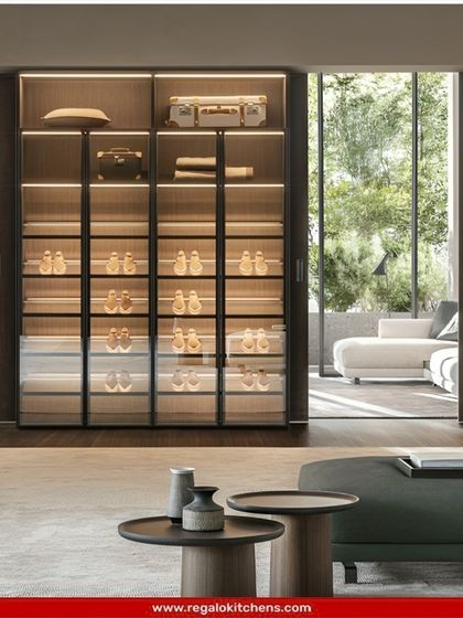 A beautiful way to display a shoe collection. This glass-front cabinet with integrated lighting turns everyday footwear into a design feature.