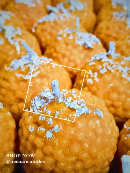 Looks like a laddu, lights like a dream. This is a close-up of our signature sweet candle, a piece that redefines festive charm and brings a smile to everyone's face.