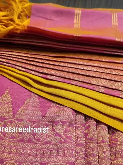 For those who prefer to do the final draping themselves, I offer ready-to-use pre-pleated sarees. This beautiful pink and yellow silk saree is perfectly folded and ready to be placed on your idol, making your preparation simple and elegant.