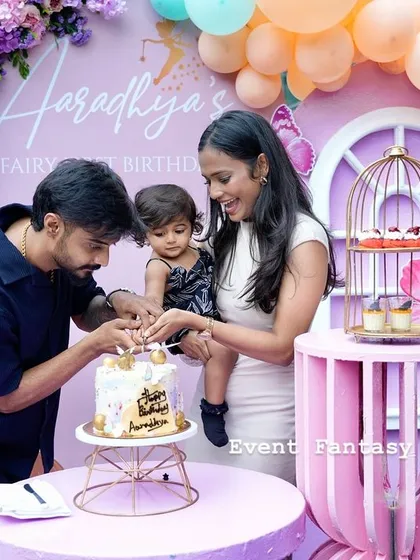The cake-cutting moment at Aaradhya's first birthday, a memory to cherish forever.