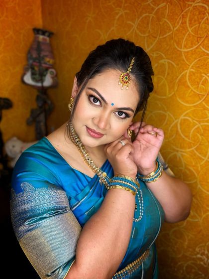 A portrait of this client, her makeup looking elegant and her eyes defined.