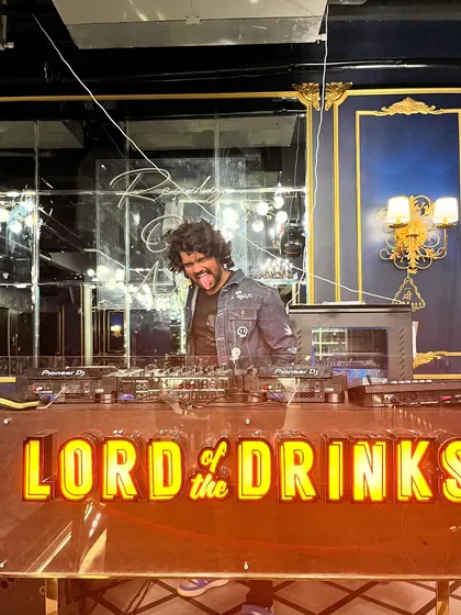 Ordinary clicks are boring. A fun, energetic shot of me behind the decks, bringing my personality to the party.