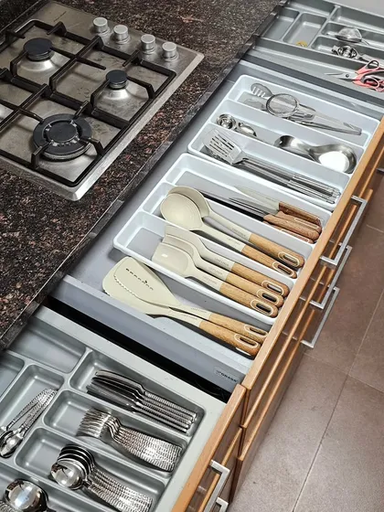 A perfectly organized cutlery drawer is a small detail that makes a huge difference in your daily kitchen routine. I use adjustable dividers to create a specific home for every spoon, fork, and spatula, ending the daily search for the right utensil.
