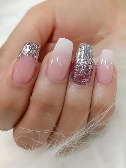 A close-up of the glitter and ombre nails, perfect for a party or special event.