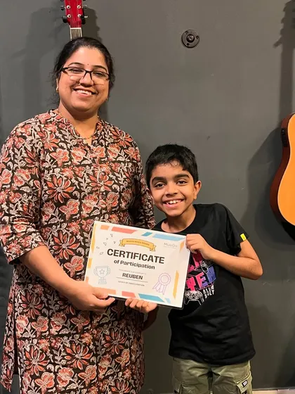 We're so proud of Reuben, seen here with his mother, holding his certificate of participation. His dedication during the workshop was truly inspiring to see.