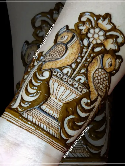 A close-up of a unique motif featuring two parrots on a pot, a playful and artistic element to add to any design.