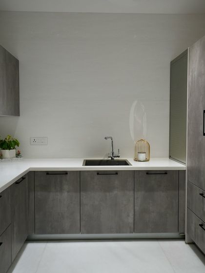 A view of the wet kitchen, designed for functionality with ample counter space and a practical layout.