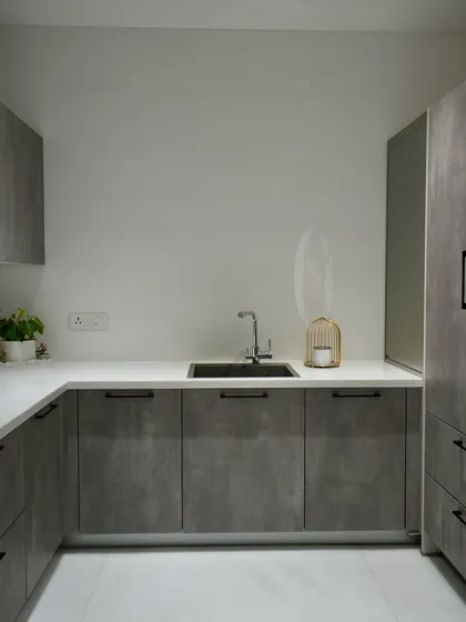A view of the wet kitchen, designed for functionality with ample counter space and a practical layout.