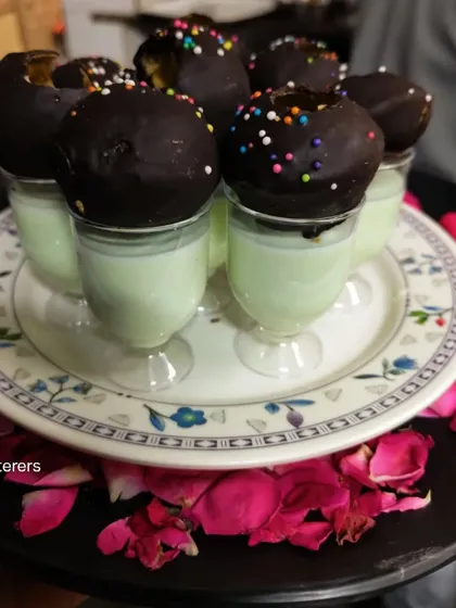 A fun and refreshing end to your meal. Our Paan Shots are served in small glasses with chocolate-coated puris, combining the classic flavor of paan with a modern twist.