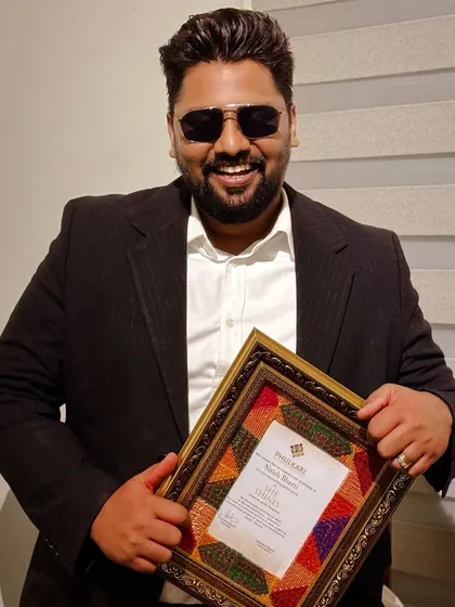 Holding a certificate of appreciation from Phulkari. Women empowerment is a theme I am passionate about, and it was an honor to showcase the inspiring journey of this organization.