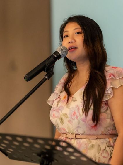 Live music is an essential part of our celebrations. A talented singer performs carols during our Christmas tree-lighting ceremony, filling the air with holiday cheer.