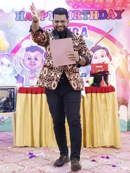 A final wave after a successful show. Seeing the happy faces in the audience is the greatest reward for any magician.
