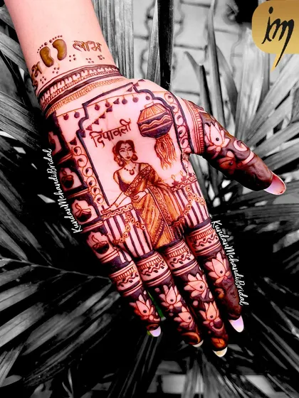 This Diwali special design features a woman holding a kalash and diyas, with auspicious 'Shubh Labh' written on the wrist.