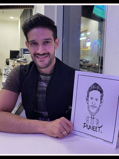 A guest from a live caricature session in Mumbai. The classic black and white style is always a popular choice.