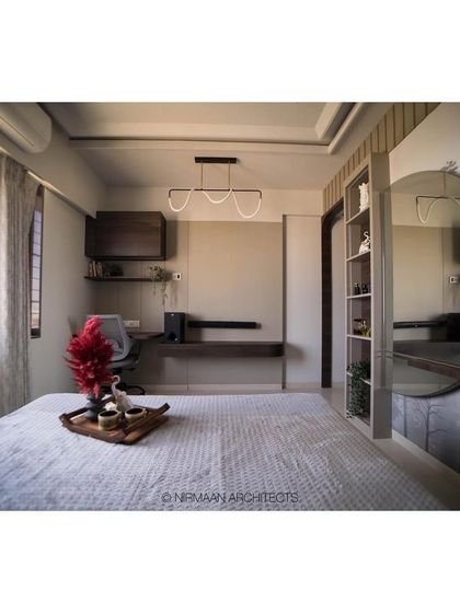 A wide view of the master bedroom with an integrated study and dressing area. The design ensures that every square foot is used effectively without compromising on style or comfort.