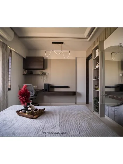 A wide view of the master bedroom with an integrated study and dressing area. The design ensures that every square foot is used effectively without compromising on style or comfort.