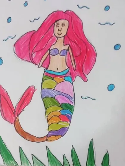 This colorful mermaid drawing is full of imagination. We encourage kids to create their own magical worlds on paper, using bright colors to make their ideas shine.