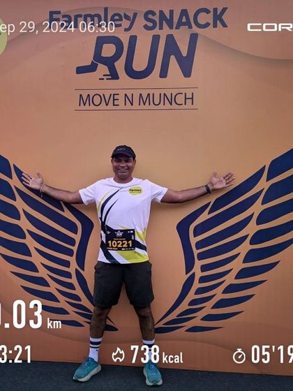 A runner celebrating his 10km finish at the Farmley Snack Run. This image shows his run stats, highlighting the achievement and personal satisfaction our events provide.