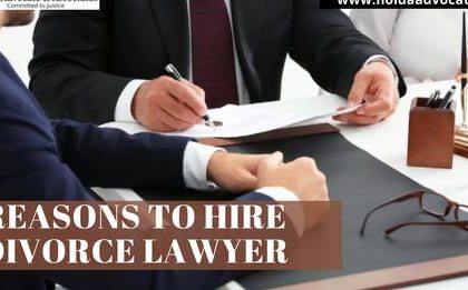 There are many important reasons to hire a divorce lawyer, from ensuring paperwork is filed correctly to advocating for your interests. This image shows a consultation, which is the first step.