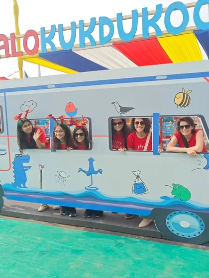 The team having some fun at a photo booth at the Kukdukoo Fest. It’s not all work; we love to play and be silly too. This captures the fun-loving spirit of our tribe.
