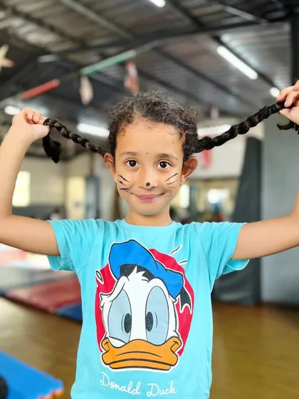 A cute and playful moment. Our studio is a place where kids can be kids, building friendships and having a great time while learning.