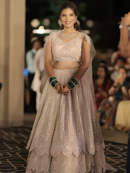 A duplicate of image 72, showing the full sangeet look.